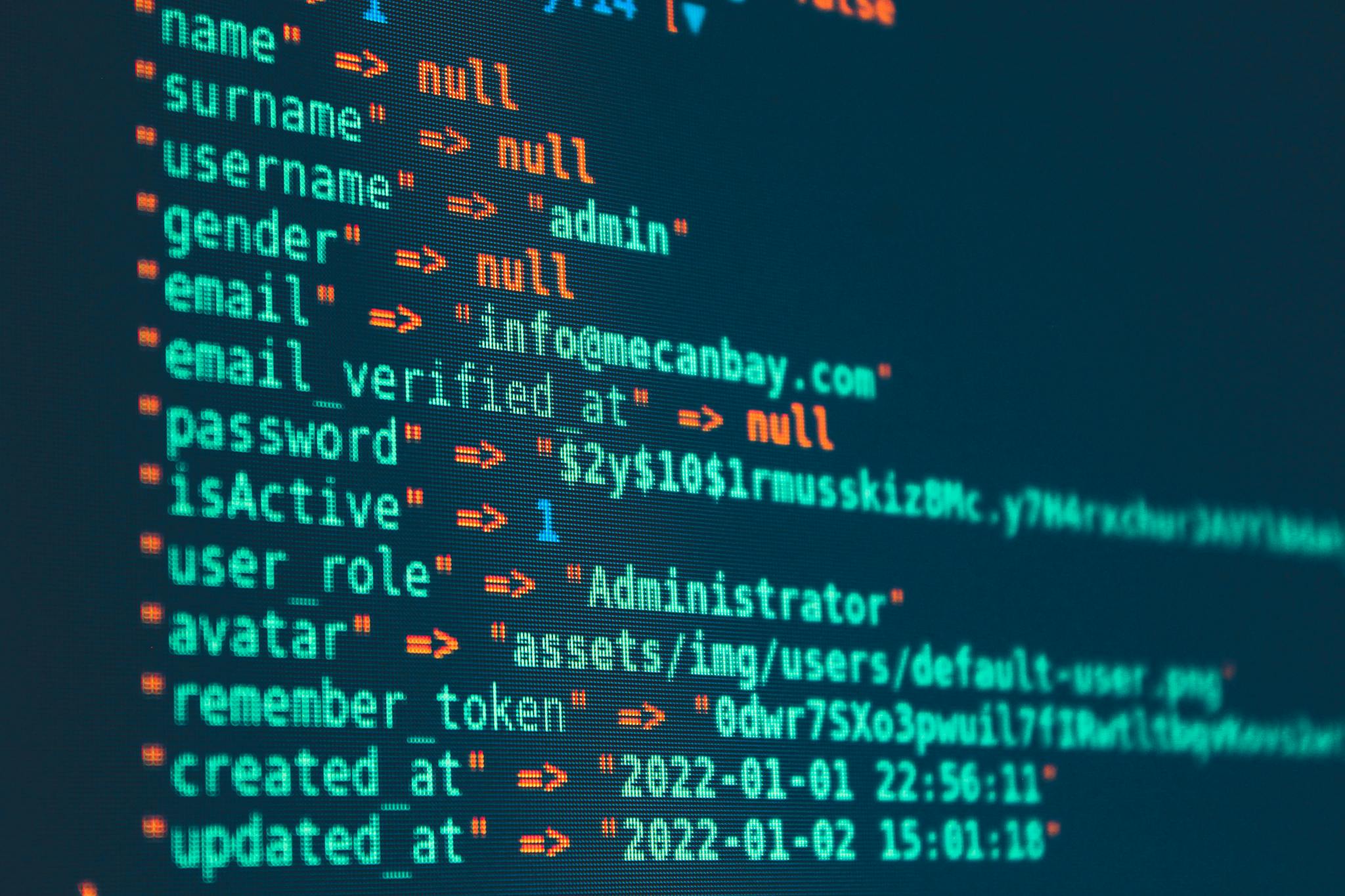 Vibrant close-up of code displayed on a monitor with various programming details.